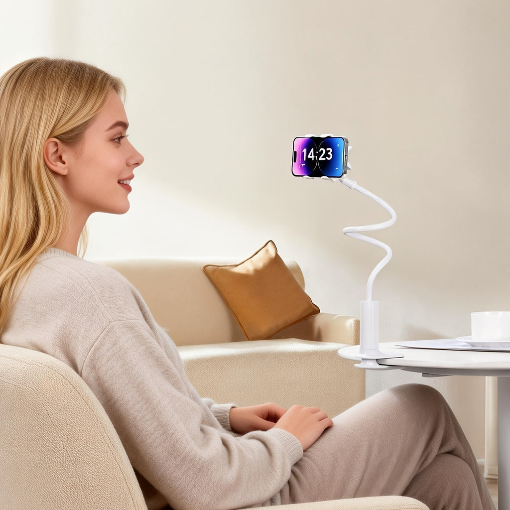 White minimalist ABS flexible gooseneck phone holder clamped to a table, used hands-free.
