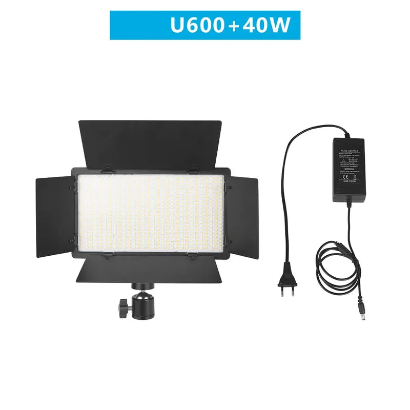 Black Nagnahz LED video light panel with adjustable barn doors, bright LED array, and AC power adapter.
