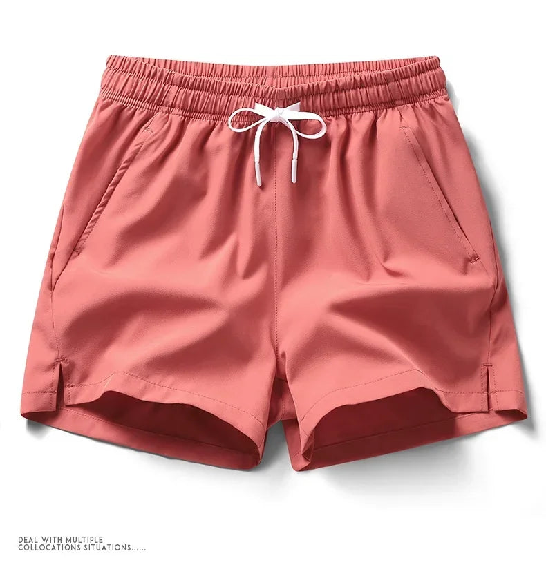 Calções de ginásio dos homens esportes sweatpants bolsos ginásio shorts casuais básicos calças leves correndo jogging praia shorts masculino banho