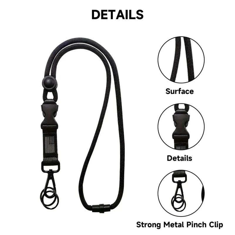 Black heavy-duty polyester tactical lanyard with quick-release buckle, American flag detail, metal clip, and keyrings.