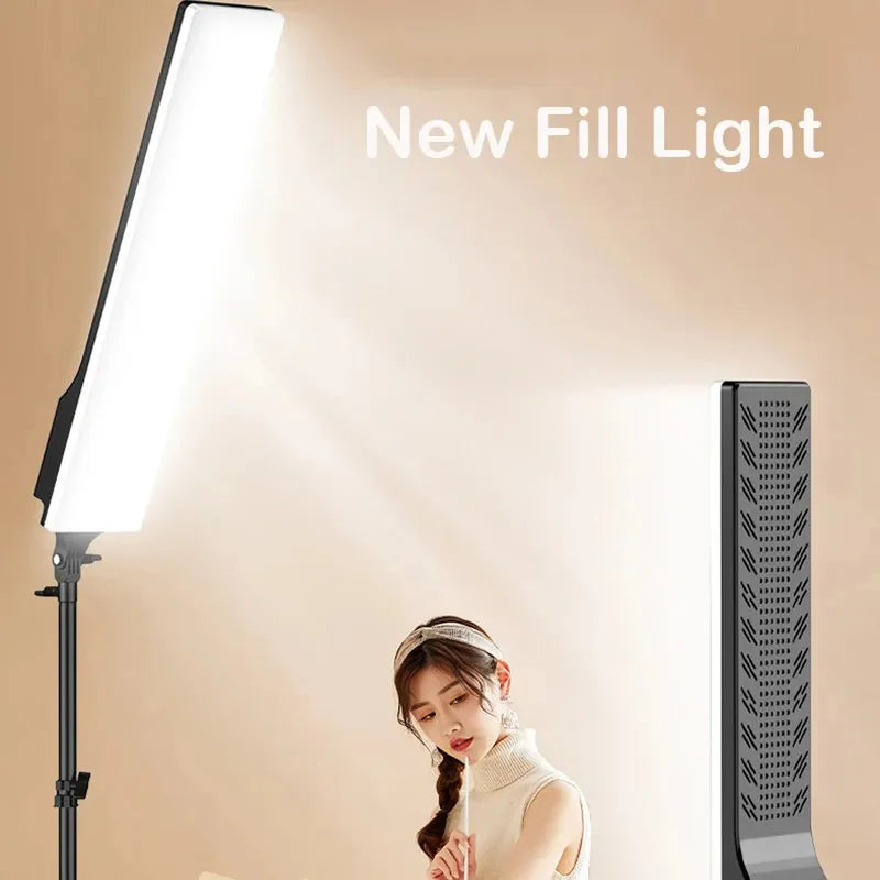 Two black rectangular LED video lights, one on a long arm stand, providing bright dimmable continuous lighting for photo studios.