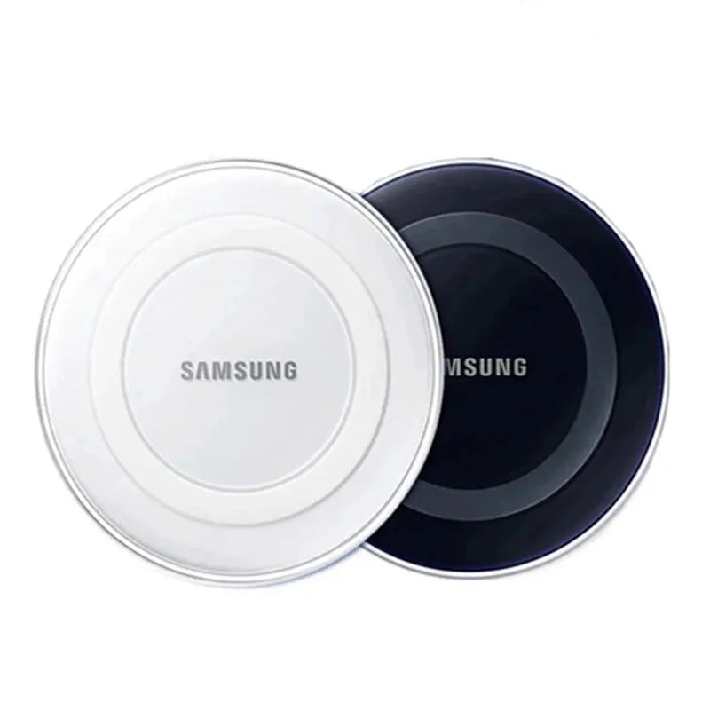 White and black Samsung Qi wireless charging pads, circular and sleek, displaying the Samsung logo.
