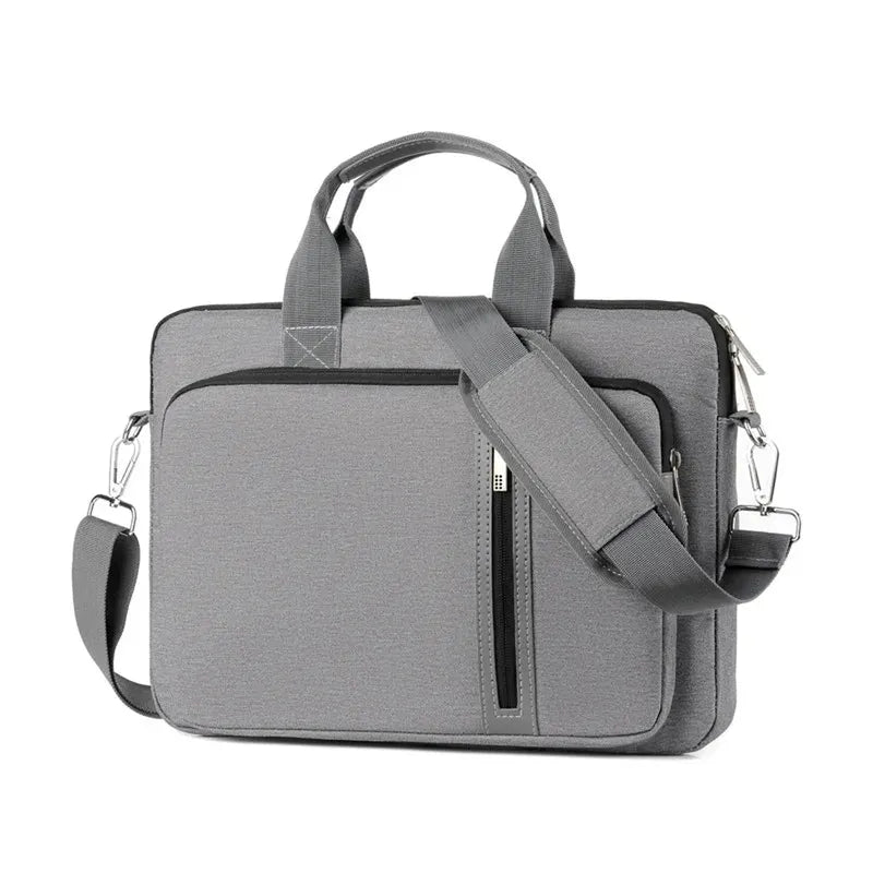 Grey polyester laptop messenger bag with top handles, detachable shoulder strap, and a front zippered pocket.