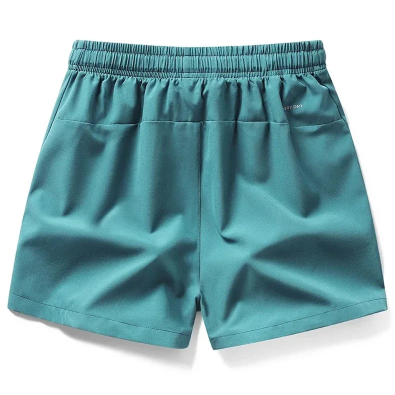 Calções de ginásio dos homens esportes sweatpants bolsos ginásio shorts casuais básicos calças leves correndo jogging praia shorts masculino banho