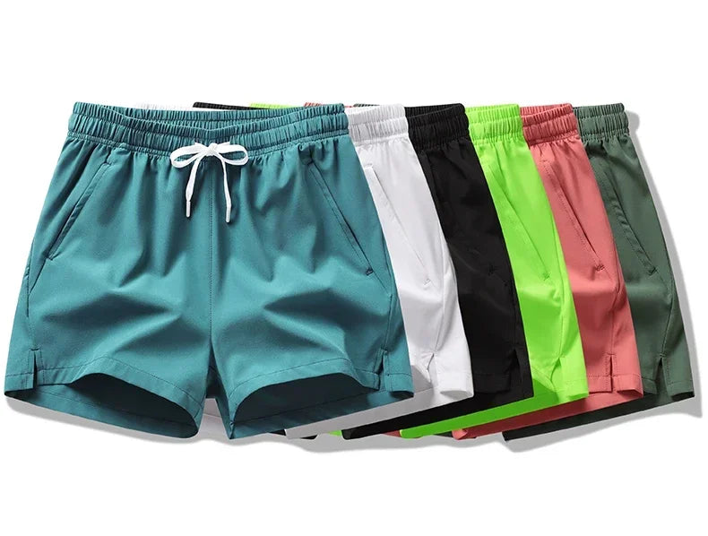 Calções de ginásio dos homens esportes sweatpants bolsos ginásio shorts casuais básicos calças leves correndo jogging praia shorts masculino banho